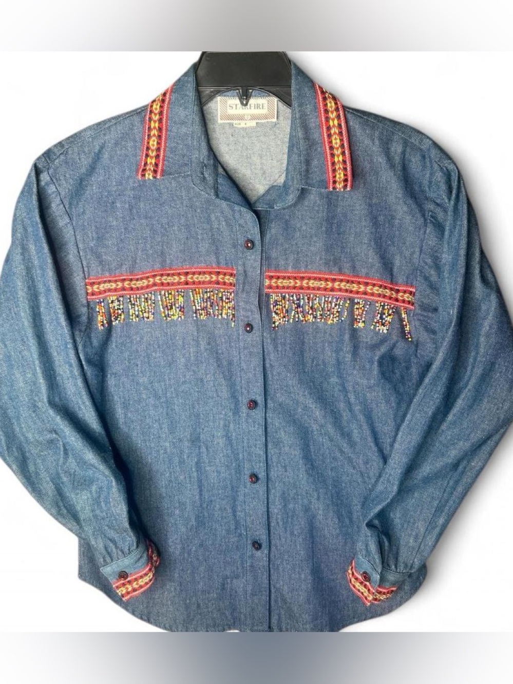 Southwestern style colorful geometric embroidery with dangling bead fringe